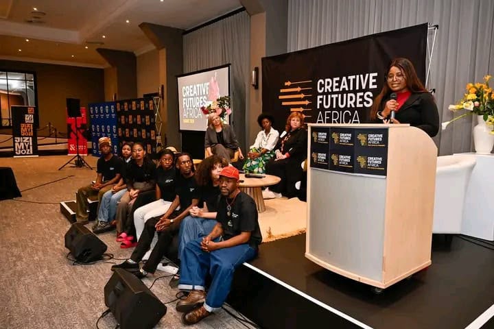 Julia speaking on stage